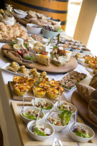 Winemaker inspecting wine barrels at Fairview
